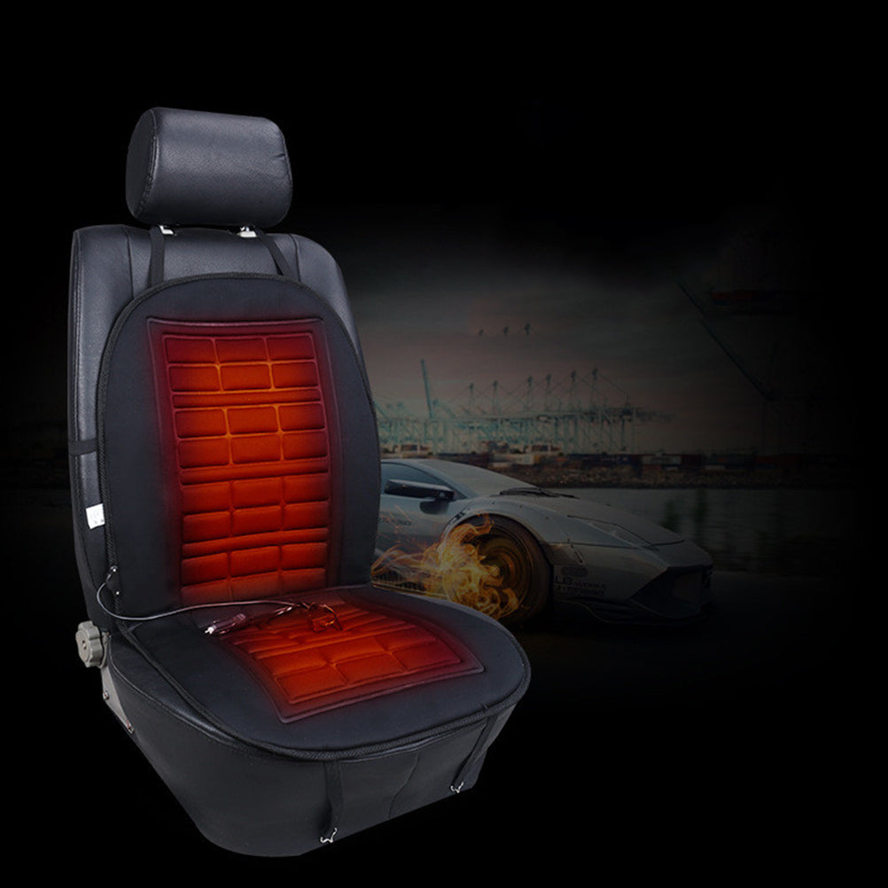 Heated car seat cushion with the heating zone glowing red on a black seat