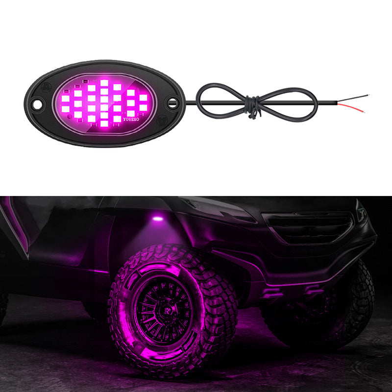 Purple underbody LED pod and the purple glow it casts in a wheel arch