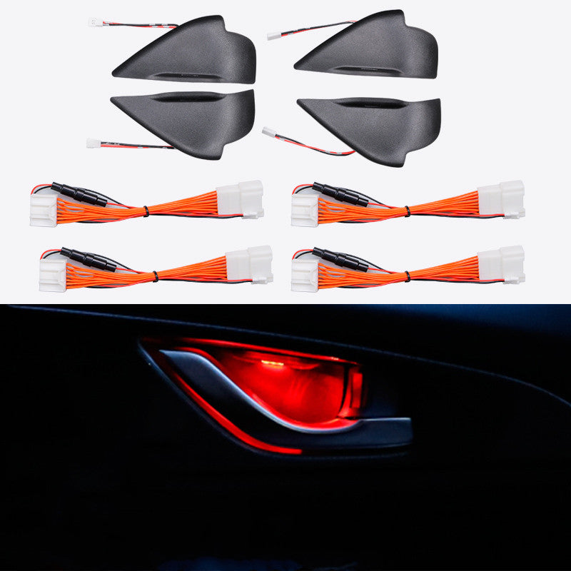 Four red LED door bowl light covers with wiring, and the red glow behind a door handle