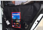 Black pet door protection mat with pockets fitted to a car door