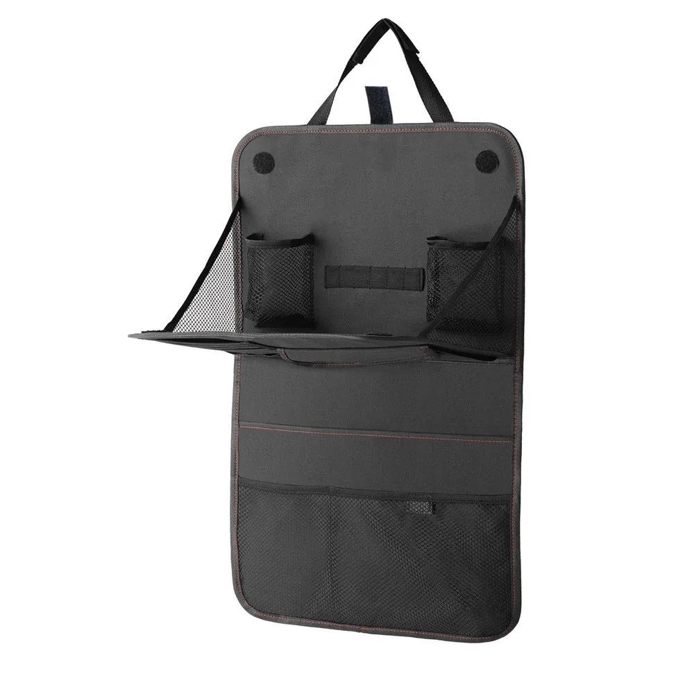 Seat back organizer pockets filled with travel items