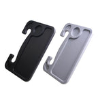 The steering wheel desk tray in both black and grey