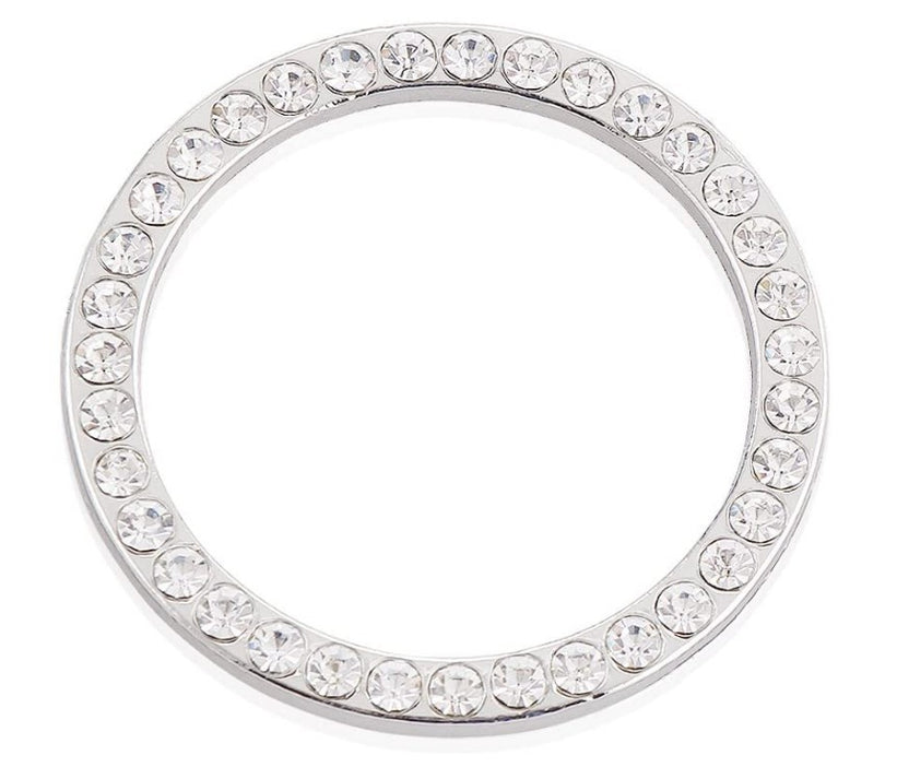 Crystal start button ring on a white background