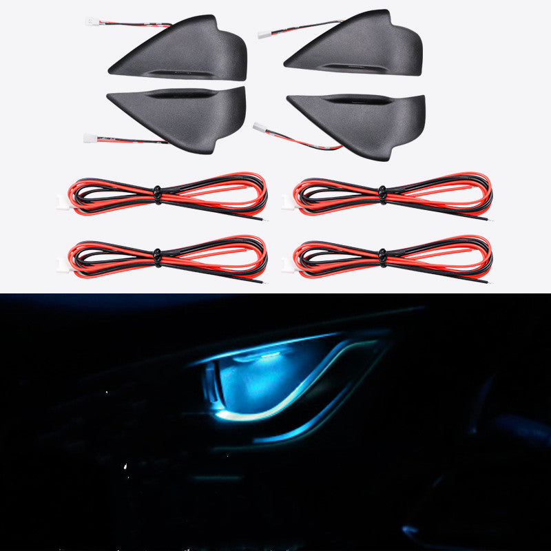 Blue LED door bowl lights with long red wiring, lit behind an interior handle