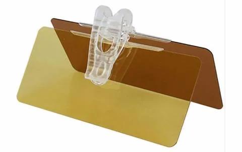 Close view of the anti-glare visor panel hinge