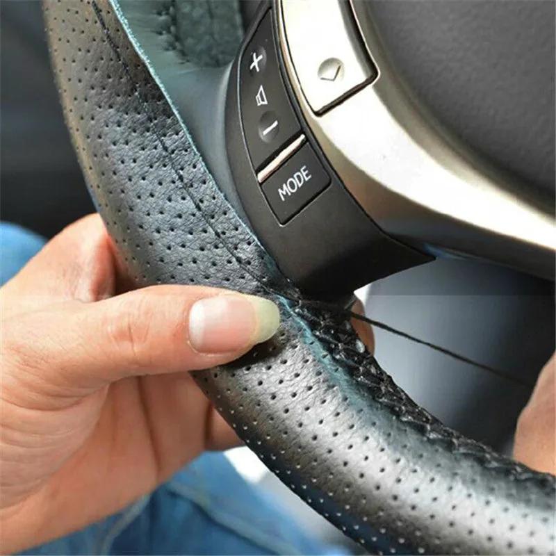 Perforated anti-slip grip detail on the fibre leather wheel cover