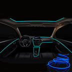 Ice blue EL wire mood line running along the dashboard and doors of a car
