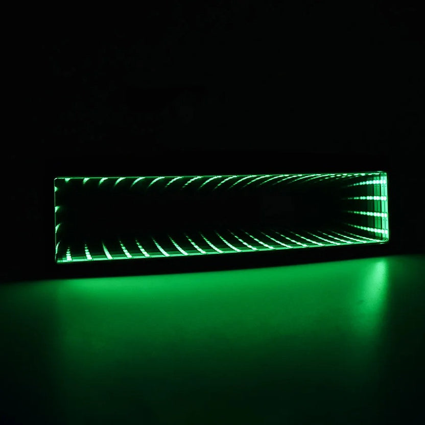 Clip-on rearview mirror glowing green in the dark