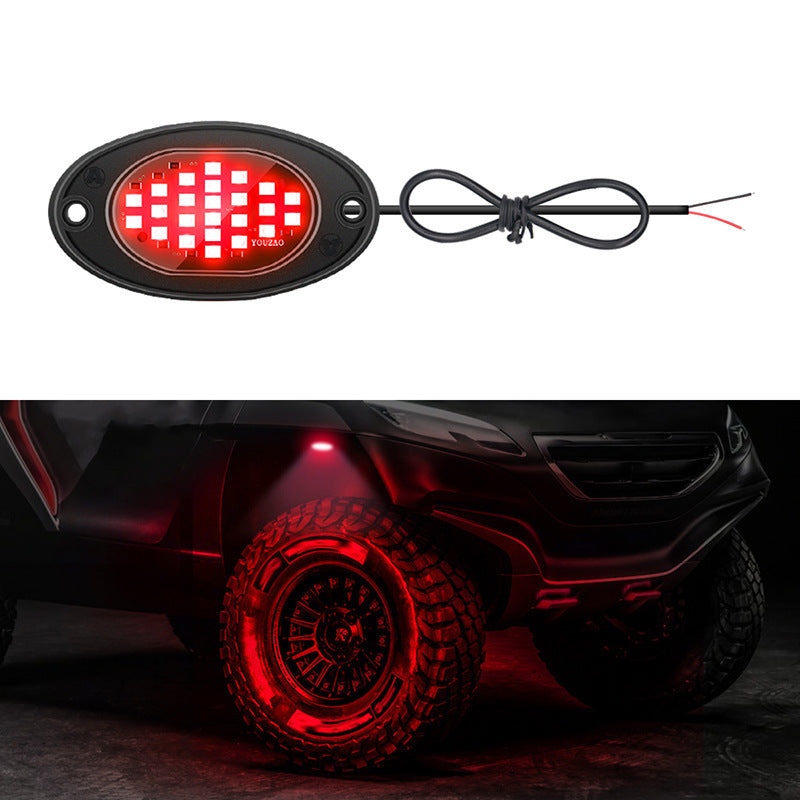 Red underbody LED pod and the red glow it casts in a wheel arch
