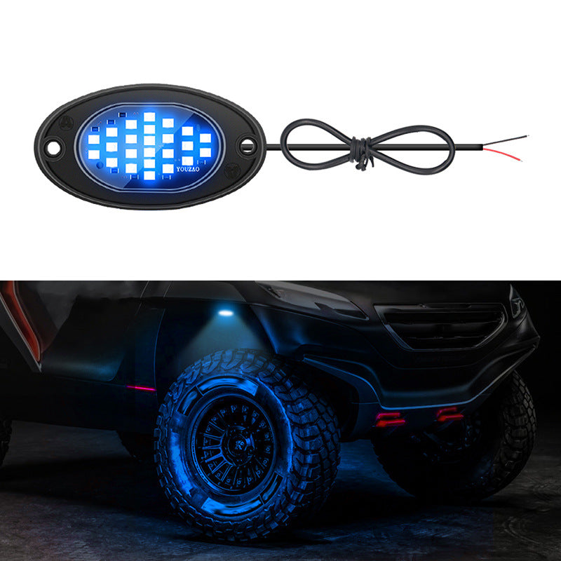 Blue underbody LED pod and the blue glow it casts in a wheel arch