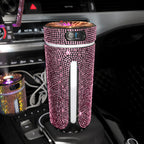 Pink crystal diamond car humidifier in a cup holder