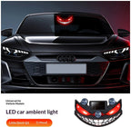 Grinning devil-eye car window light, crimson LED eyes glowing at night