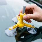 Car windshield chip and scratch repair kit being used on a windscreen