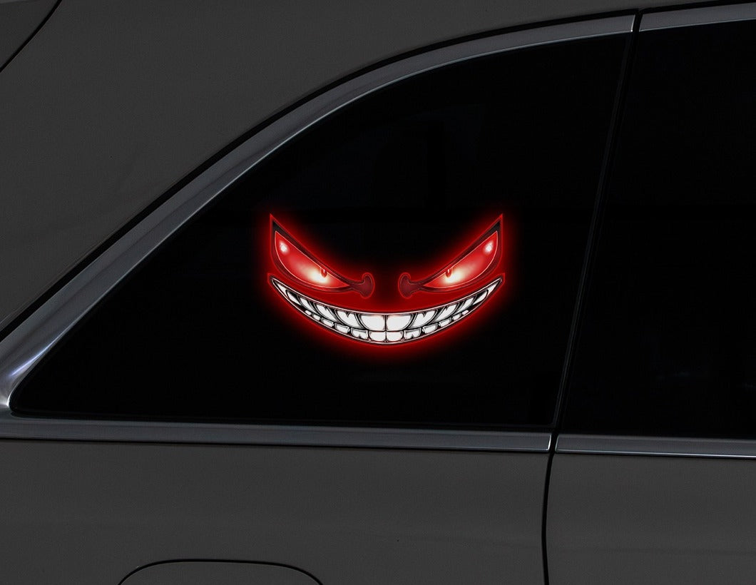 Devil eye window light glowing in a car window at night