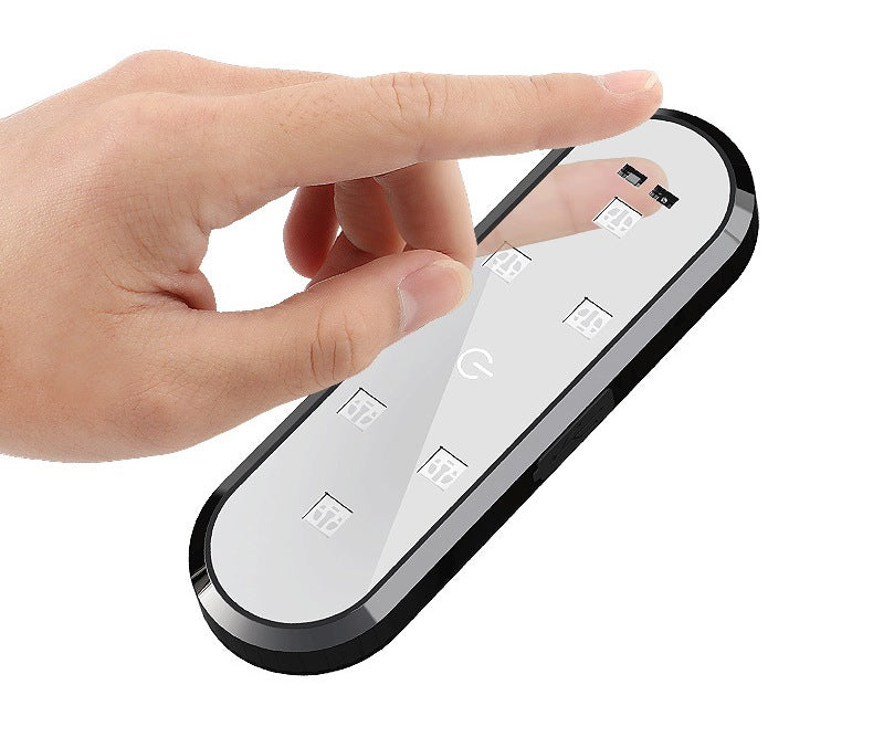 Hand holding the slim magnetic LED door open warning light