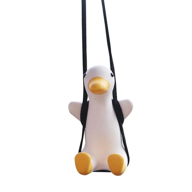 Rearview mirror charm on its swing