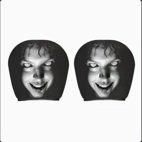 Eyeless laughing face car headrest cover, pack of two