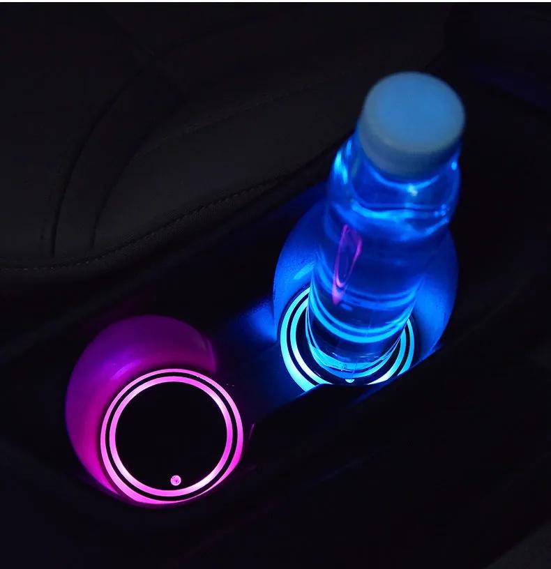 Starry Night Kit: LED cup holder mat glowing under a bottle in a car