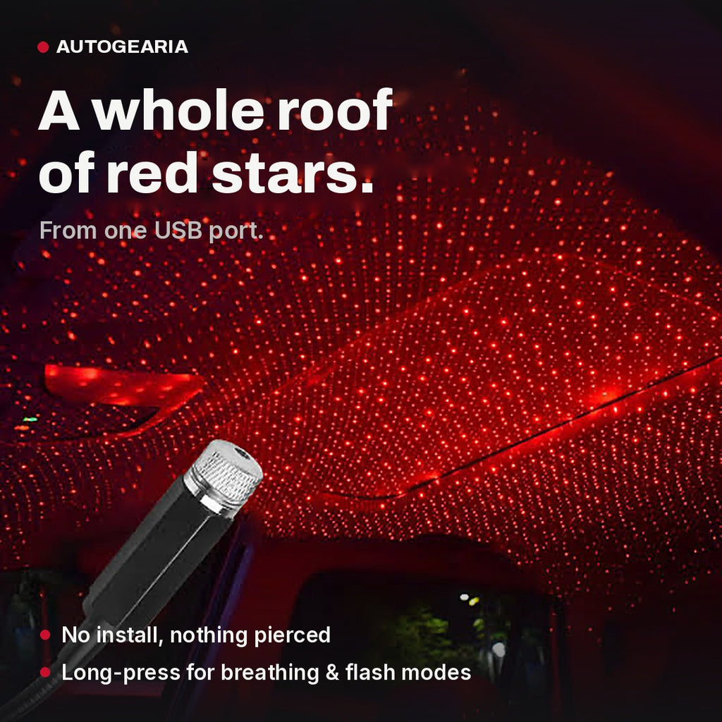USB star projector filling a car roof lining with a red starfield