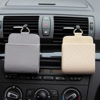 Hanging Car Vent Storage Bag in use — grey and beige bags hooked onto dashboard air vents